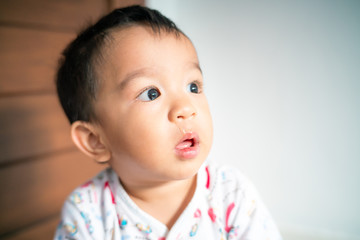Asian baby boy was sick snot flowing from nose