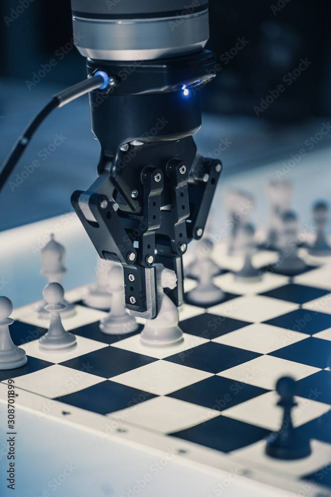 Poster Close Up Vertical Shot of Artificial Intelligence Operating a Futuristic Robotic Arm in a Game of Chess. Robot Moves a Knight. High Tech Modern Research Laboratory.