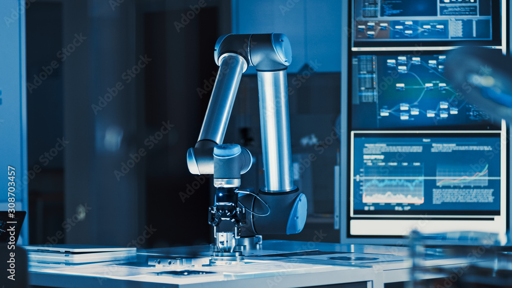 Poster futuristic artificial intelligence robotic arm operates and moves a metal object, picks it up and pu