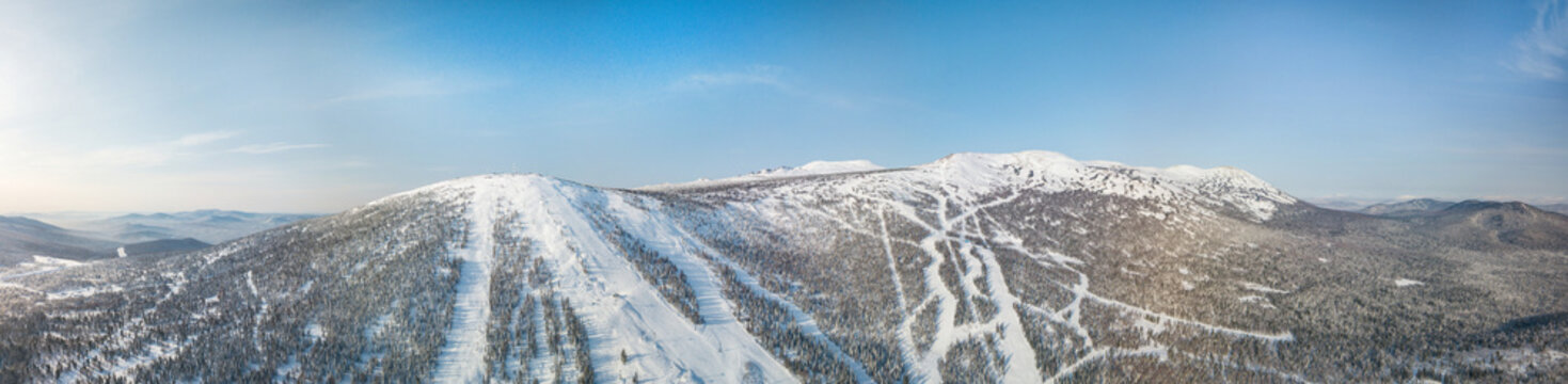 Aerial view of Sheregesh Ski Resort, mountains covered by snow , Russia.