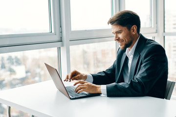 businessman working on laptop in office