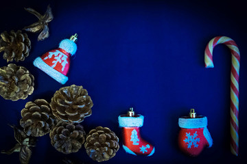 Christmas composition of Santa Claus clothes decoration on blue background.