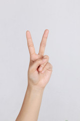 peace symbol using the left hand