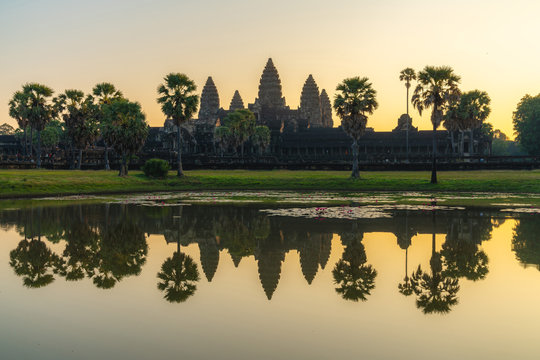 Beautiful view of Angkor temple with sunrise pastel color sky in morning. Angkor Wat is a temple complex in Cambodia and the largest religious monument in the world. Siem Reap, Cambodia.