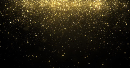 Gold glitter confetti particles falling, golden sparkling light shine background for Christmas holiday. Abstract magic golden glowing shimmer confetti with firework glittering sparks © Ron Dale