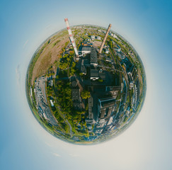 Pipes for thermal power plants in the city. 360 vr Drone shot