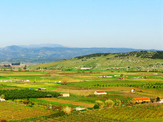 Fototapeta na wymiar Panoramic view of Selcuk country side landscape from the slopes of Ayasuluk Hill just below the fortress near the center of Selcuk, Izmir Province, Turkey.