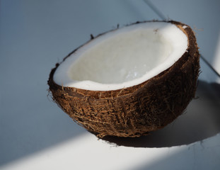 the broken coconut in a neon tint as the background, ready card