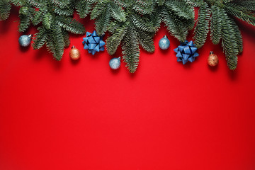 Fototapeta na wymiar Holiday Christmas red decoration background, Christmas tree and bauble