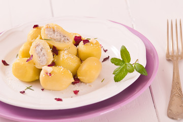 Potato gnocchi stuffed with radicchio and ricotta.