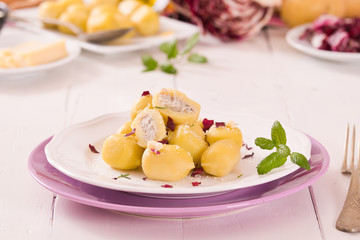 Potato gnocchi stuffed with radicchio and ricotta.