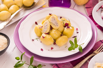 Potato gnocchi stuffed with radicchio and ricotta.
