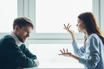 man and woman shaking hands