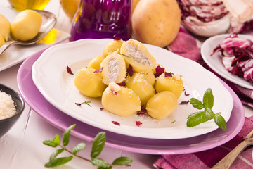 Potato gnocchi stuffed with radicchio and ricotta.