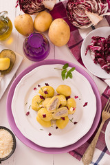 Potato gnocchi stuffed with radicchio and ricotta.
