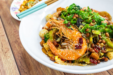 Mala Xiang Guo (stir-fry pot). China, Chongqing Sichuan Spicy Fragrant Pot. Oily, spicy, and numbing Chinese sauce which consists of peppercorn, chili pepper and various spices simmered with oil.