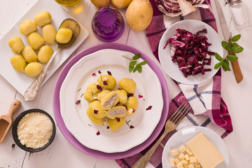 Potato gnocchi stuffed with radicchio and ricotta.