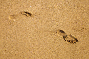 footprints of man in the sand