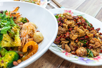 Authentic Sichuan Szechuan fried chicken with spicy red hot chillies & peppercorns. Asia, Chin