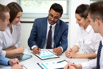 International business team discuss a new project