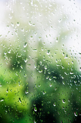 summer rain leaves a drop on the window © Anastasia