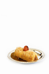 traditional oriental turkish arabic sweet baklava on a decorative plate
