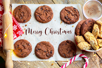 Baked Christmas cookies. Homemade Chocolate Chip Cookies. Top view flat lay background.Chocolate and nut cookies for the new year. Christmas 2020. New Year card with sweets. Sweets for the holiday