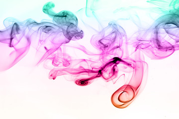 Colorful smoke abstract on white background. movement of ink water