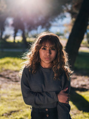 young latin woman with brown hair brown skin and dark eyes