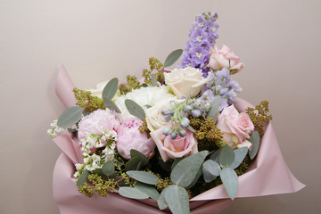 bouquet of beautiful flowers in pastel colors. The concept of holidays and gifts. Wedding, Valentine's Day.