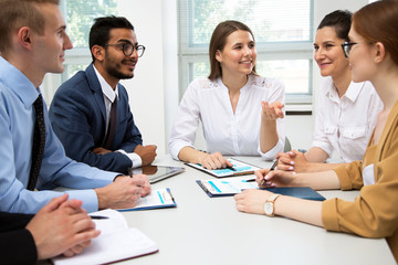 International business team discuss a new project