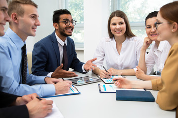 International business team discuss a new project