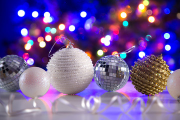 Christmas balls against the backdrop of a Christmas tree