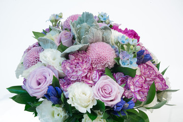 floral bouquet of different flowers on a white background.