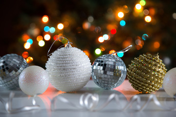 Christmas balls against the backdrop of a Christmas tree