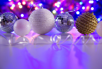 Christmas balls against the backdrop of a Christmas tree