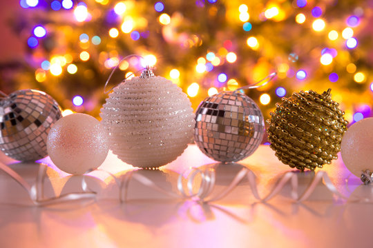 Christmas balls against the backdrop of a Christmas tree