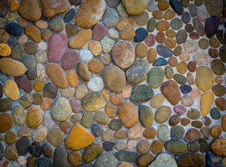 Beautiful sea stone on cement wall texture for background. floor