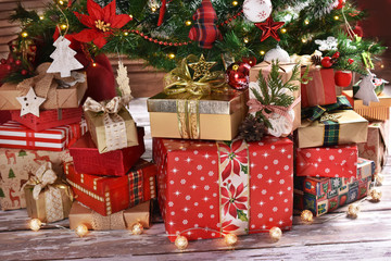 Fototapeta na wymiar lots of presents under Christmas tree