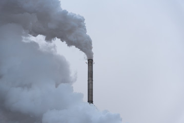 Smoke outlet in chimney of olive by-products factory in Toledo, Spain