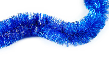 Christmas tinsel on white background