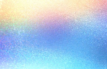 Wonderful sparkles pattern. Yellow blue shimmer surface texture. Glitter abstract background. Festive design.