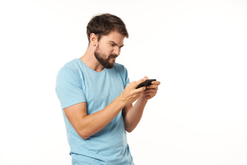 young man texting on his phone