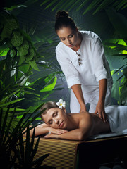 portrait of young beautiful woman in spa environment