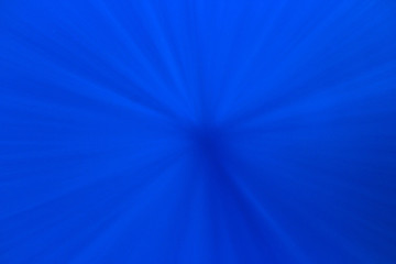 Blue water background and sunbeams 