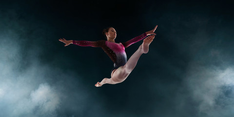 Fototapeta na wymiar Female gymnast.