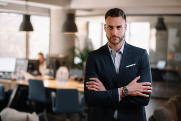 Handsome businessman in office. 