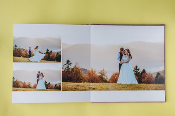 Luxury white leather wedding photo album and photo book - obrazy, fototapety, plakaty