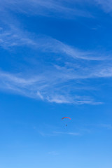 paragliding in the blue sky