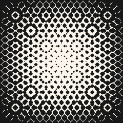 Vector halftone geometric seamless pattern with spots, floral shapes, petals. Graphic monochrome texture with radial gradient transition effect. Abstract repeat background. Modern repeatable design